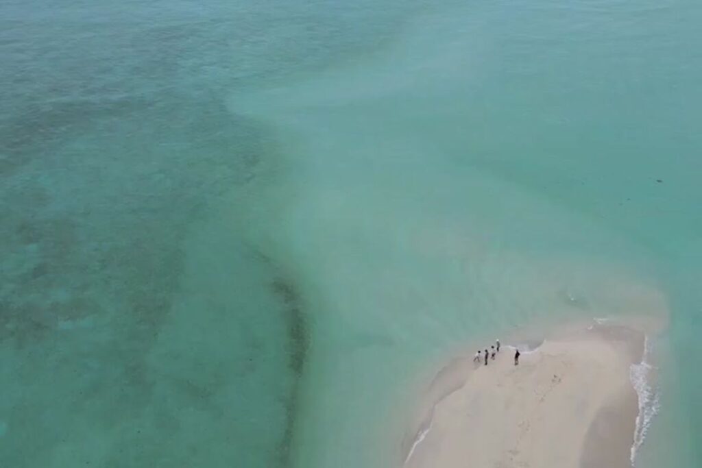 Drone view of a sandbar near Miyako Island, Okinawa – a popular destination for families and beach lovers.