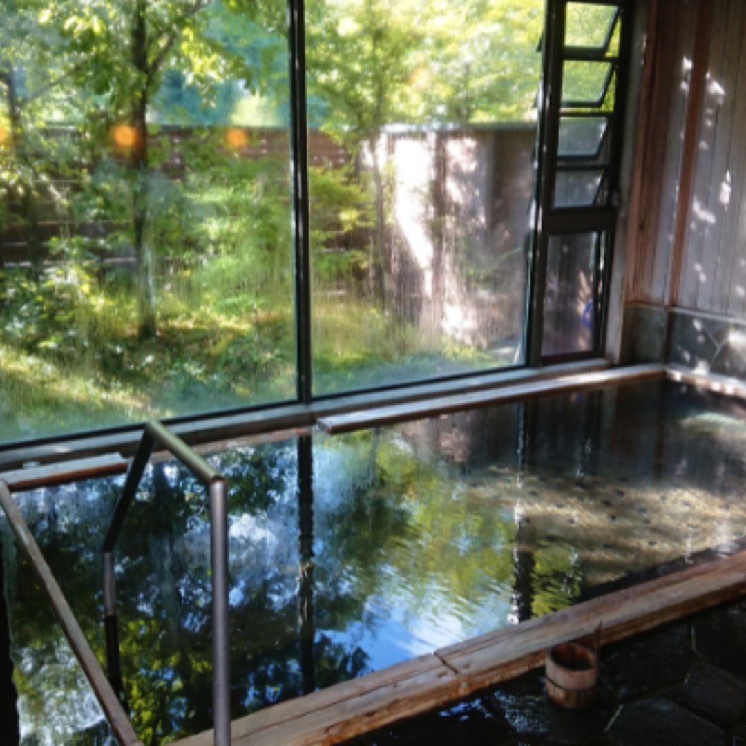 Private open-air bath surrounded by nature at Sugishima Ryokan near Gujo, Gifu