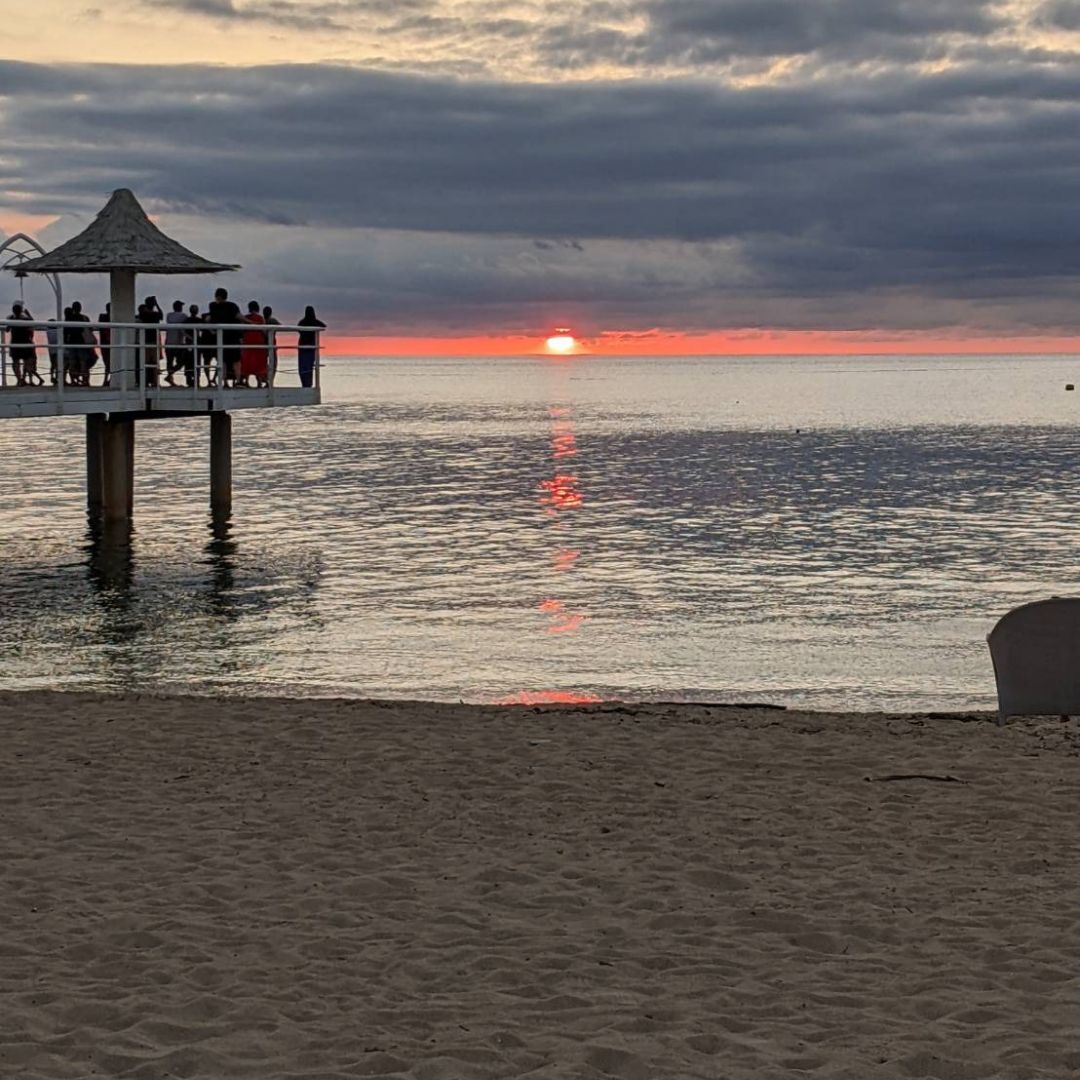Sunset over the ocean from Fusaki Resort Hotel – a scenic family resort in the Okinawa islands.