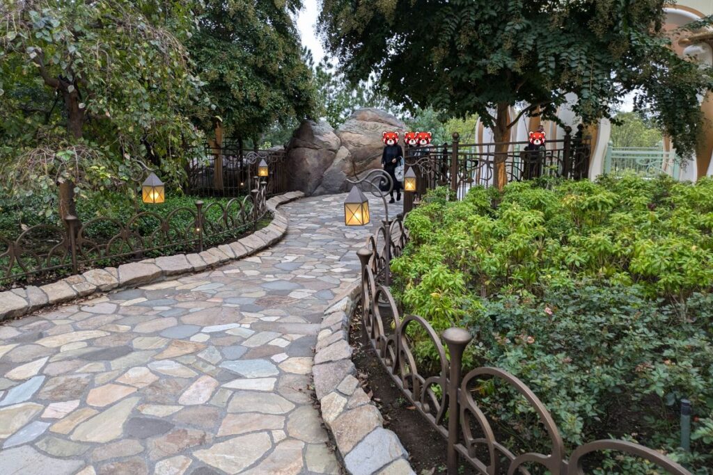 Pathway in the enchanted courtyard inspired by Beauty and the Beast at Tokyo DisneySea Fantasy Springs Hotel, exclusive to guests