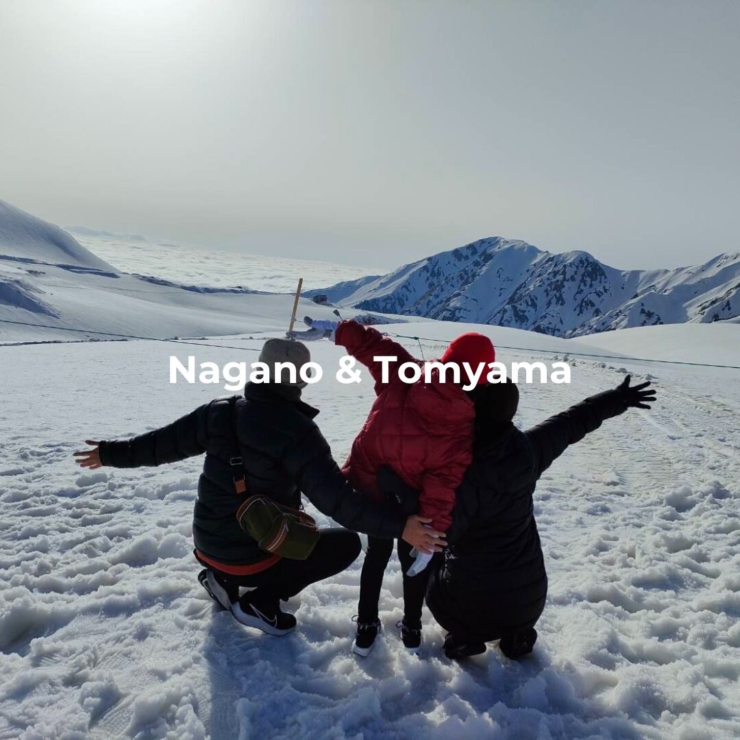 Family enjoying snow in the Japanese Alps, representing Nagano and Toyama winter adventure