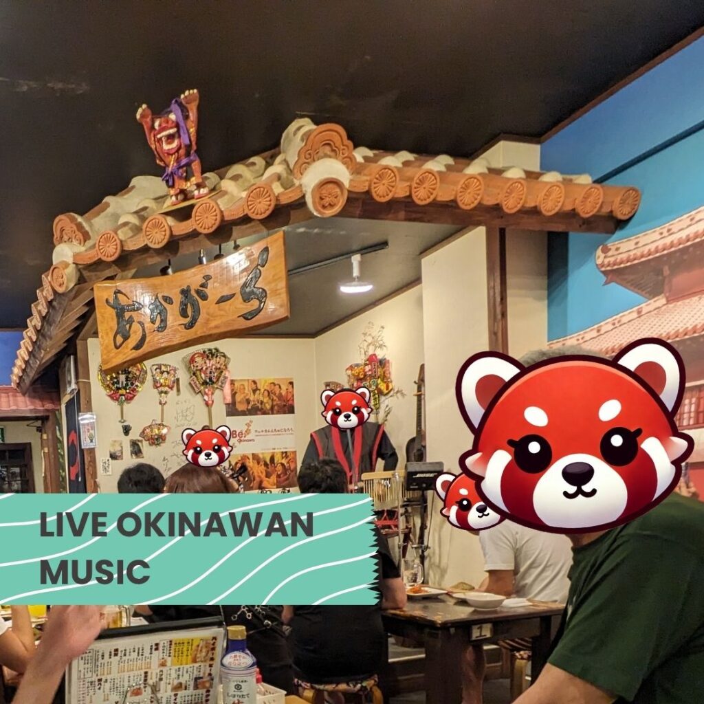 Restaurant with live Okinawan music performance and traditional decor.