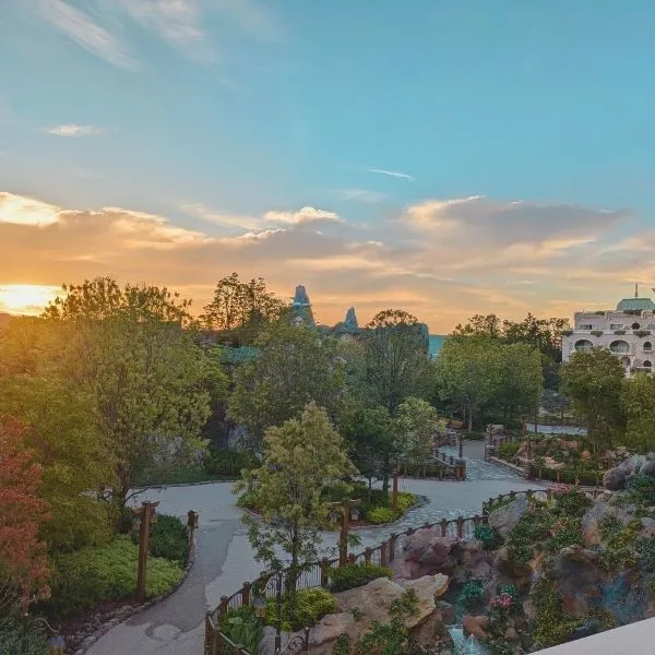 Sunrise from Fantasy Springs Hotel – Scenic view of the Fantasy Springs area and lush greenery.