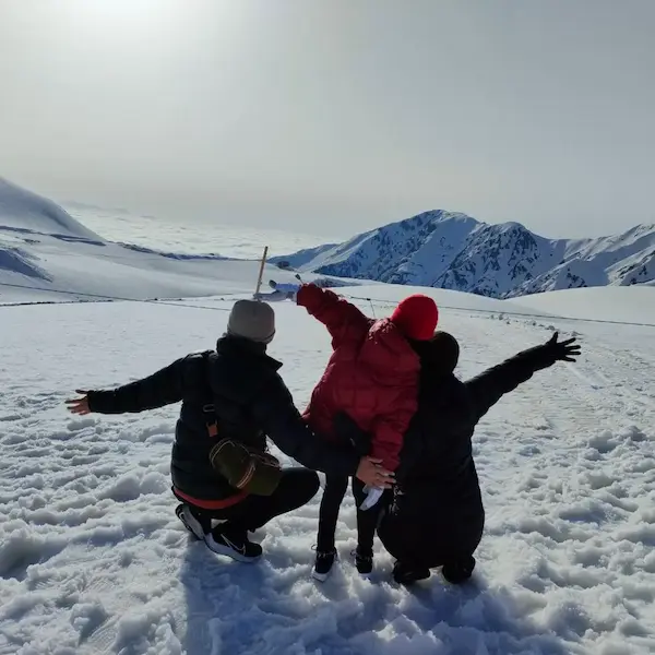 Japanese family traveling in the snow – part of our Japan travel guide for families