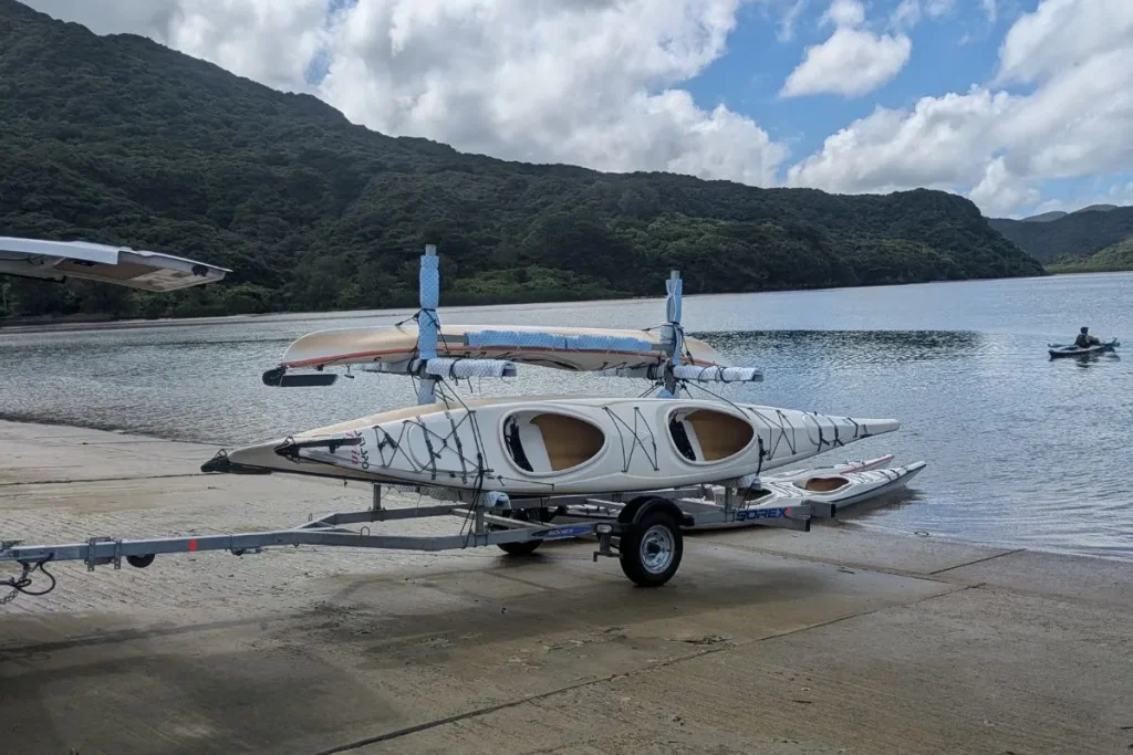 Kayaks loaded on trailer at Shirahama Port, ready for our Iriomote kayaking tour departure.