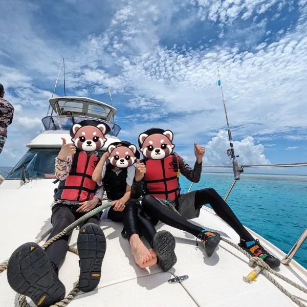 Experience the highlight of our Okinawa family travel guide—a private cruise to Yabiji, home to one of the largest coral reefs in Japan.