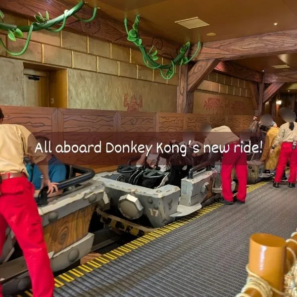 Guests boarding Donkey Kong’s new roller coaster at Universal Studios Japan 2025.