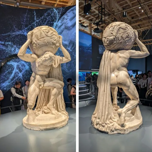 Farnese Atlas statue showcased at Italy Pavilion Expo 2025｜visitors viewing the masterpiece up close.