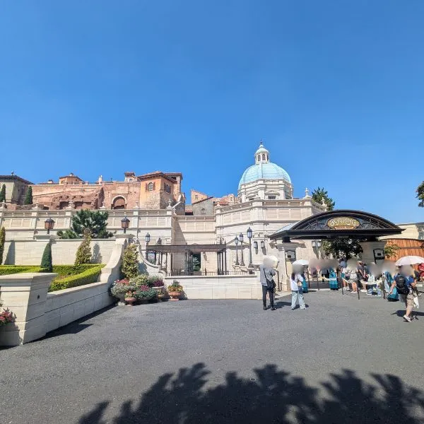 Entrance to Soaring: Fantastic Flight at Tokyo DisneySea with blue dome and Mediterranean-style details.