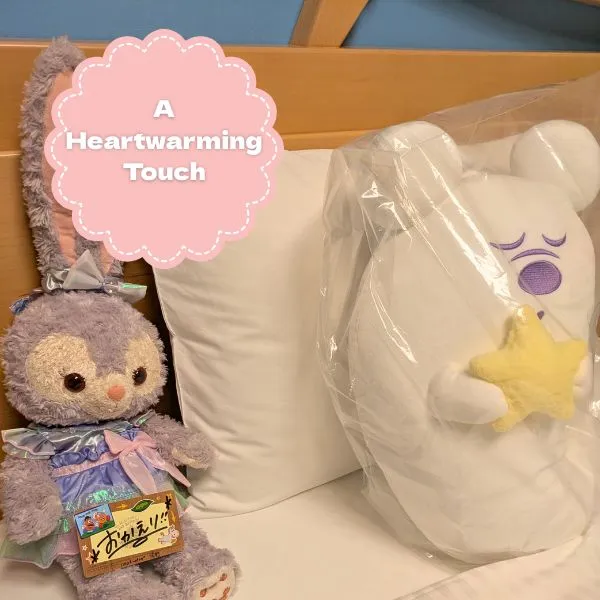Plush toys neatly arranged with a welcome card by room service at Toy Story Hotel Tokyo, adding a heartwarming touch to our DisneySea trip.